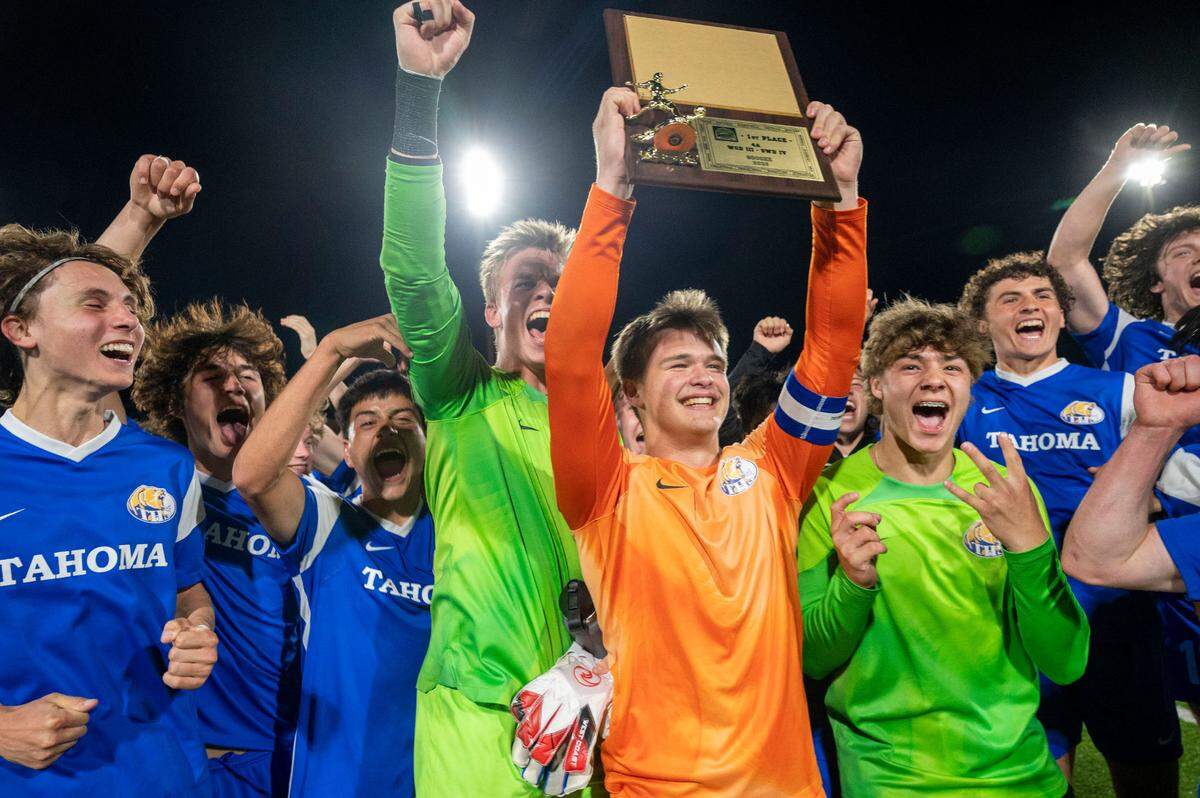 Tahoma players celebrate after beating Bellarmine Prep, 2-0, to win the 4A West Central/Southwest district soccer championship game on Thursday, May 11, 2023, at Sparks Stadium in Puyallup, Wash.