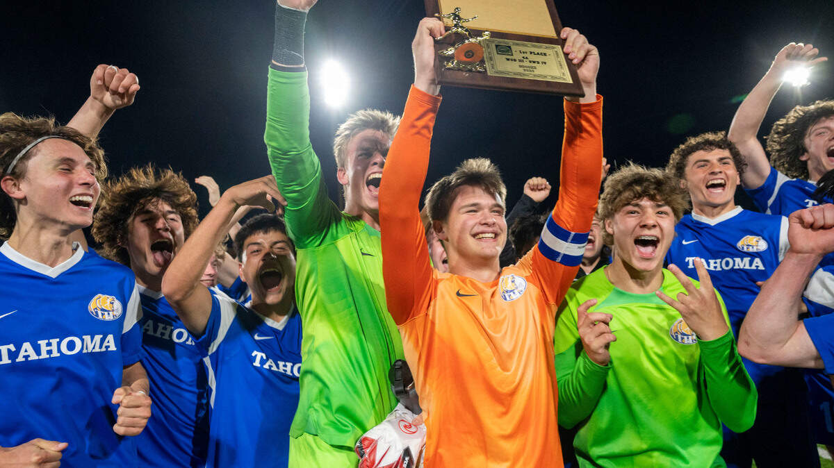 Tahoma players celebrate after beating Bellarmine Prep, 2-0, to win the 4A West Central/Southwest district soccer championship game on Thursday, May 11, 2023, at Sparks Stadium in Puyallup, Wash.