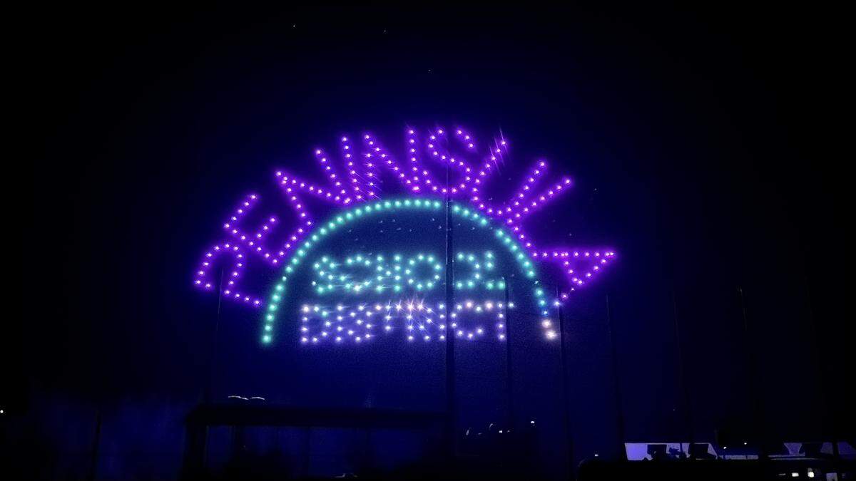The Peninsula School District name shines in illuminated letters over the Gig Harbor High School upper turf fields Thursday, Sept. 18, 2025, in Gig Harbor, Wash.