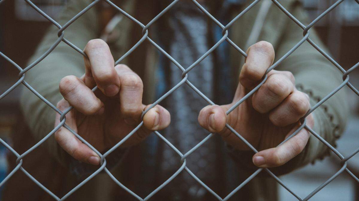 An incarcerated person is shown in this stock photo.