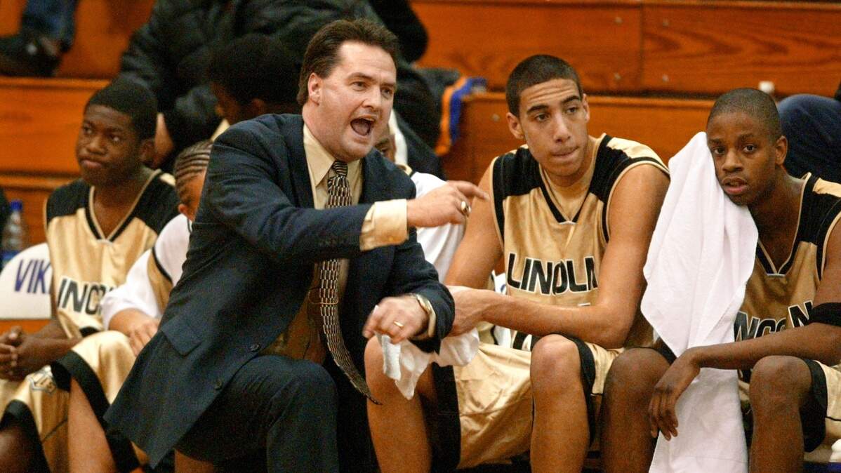 SLUG: LINCOLN HOOP TRADITION RUN DATE: SPORTS, TBD PHOTO TAKEN: Puyallup, Friday, March 7, 2003 Head coach Tim Kelly’s fiery presence on the sideline has helped the Abes win consecutive 4A state titles. (Drew Perine/The News Tribune)
