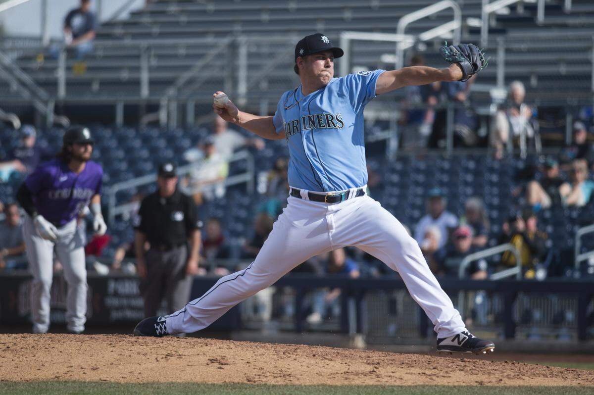 Seattle Mariners reliever Erik Swanson pitches in a spring training game against the Rockies on Monday, March 2, 2020 at Peoria Stadium in Peoria, Ariz.
