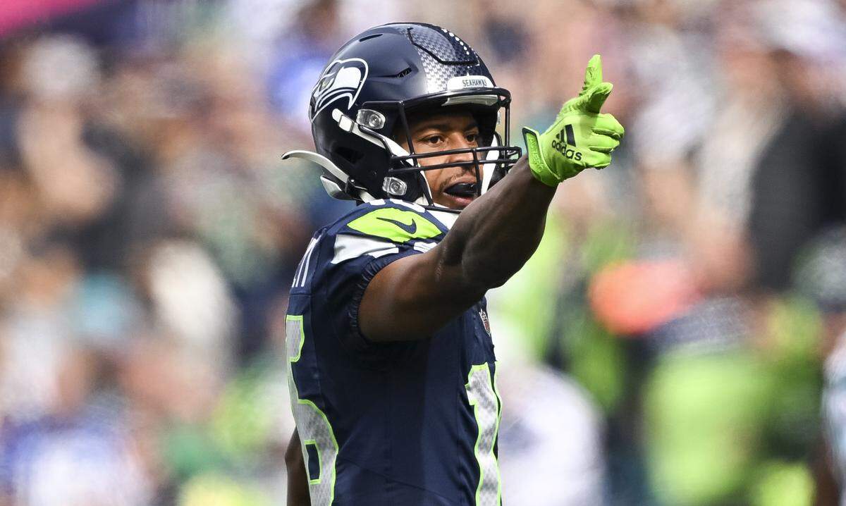 Seattle Seahawks wide receiver Tyler Lockett (16) reacts to a a first down during the first quarter of the game against the Miami Dolphins at Lumen Field, on Sunday, Sept. 22, 2024, in Seattle, Wash.