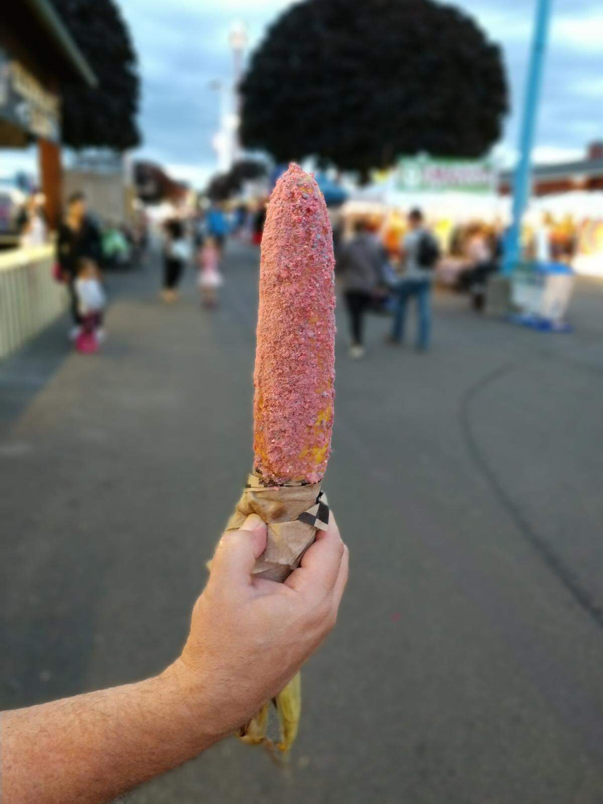 Street corn from Murph’s at the Washington State Fair can be customized with a number of flavorings.