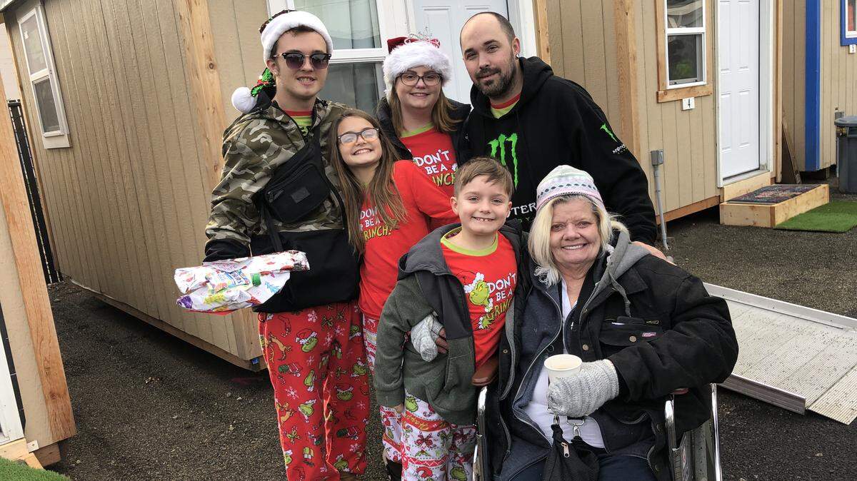 Devin Harris, seen with his wife, Tia, three children, Dylon (15), Melody (11), Dexter (8) and Tia’s mother, in December.