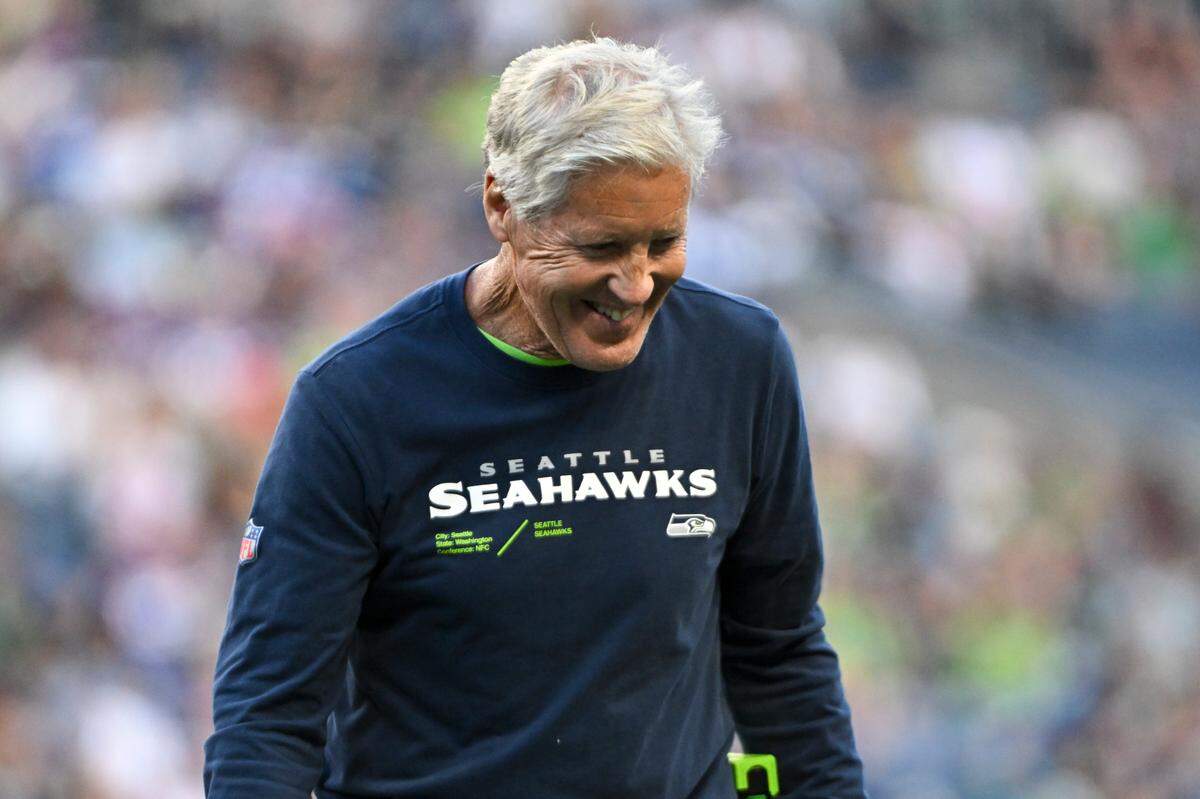 Seattle Seahawks head coach Pete Carroll laughs during the first quarter of the preseason game against the Minnesota Vikings at Lumen Field, Thursday, Aug. 10, 2023, in Seattle, Wash.