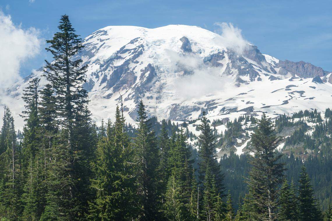 Mount Rainier is visible from a road in Mount Rainier National Park on Friday, June 6, 2025.