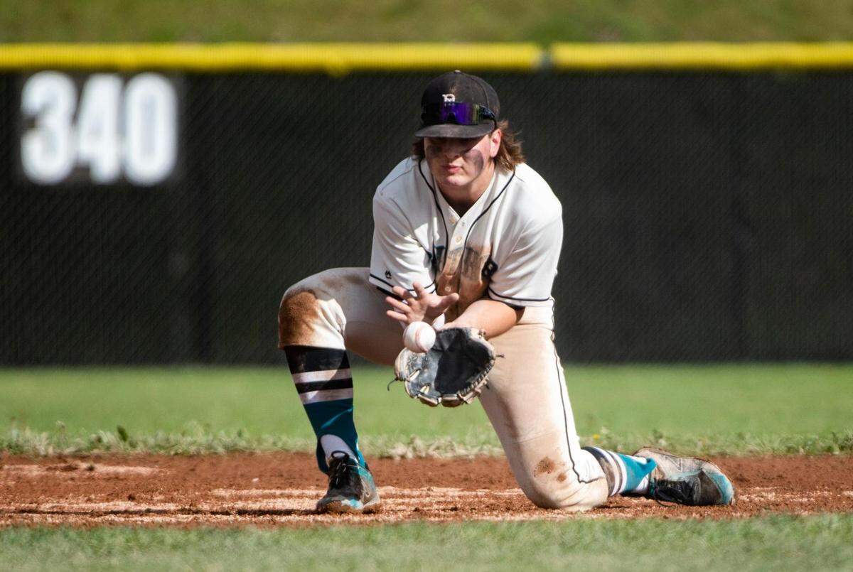 Bonney Lake High School varsity baseball shortstop Cameron Duggan (3) catches the ball during the district tournament game against Bainbridge at Bonney Lake High School in Bonney Lake, Wash. on Saturday, May 7, 2022.
