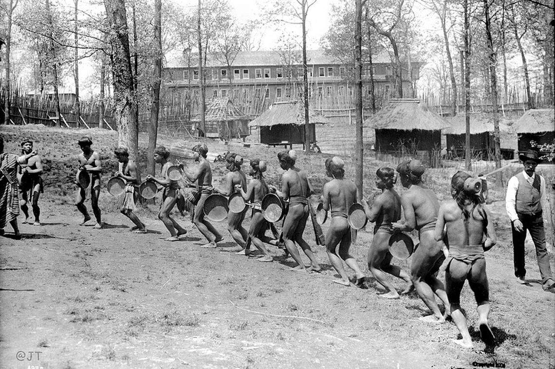 Bontoc Igorot men perform dances in the Philippine Exposition at the Louisiana Purchase Exposition, c. 1904. St. Louis Public Library, Louisiana Purchase Exposition glass plate negative collection.