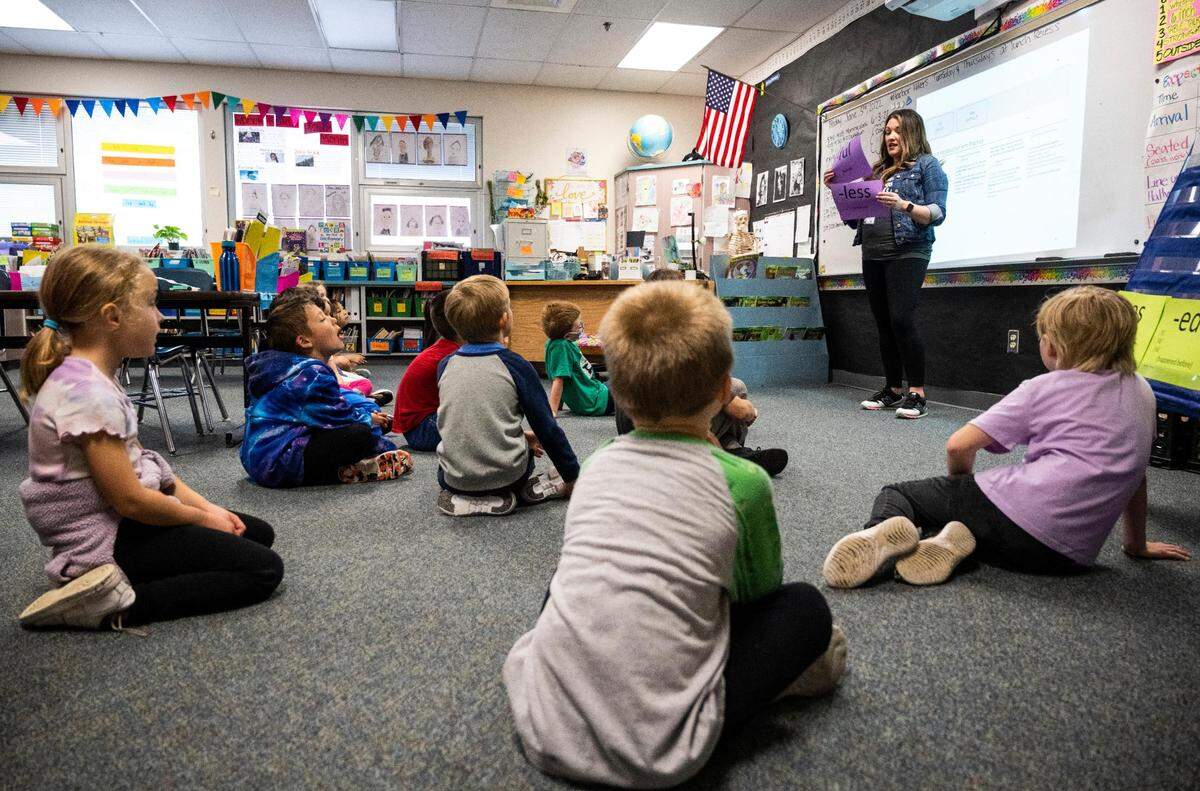 Tracy Morrison teaches Enhanced Core Reading Instruction training (ECRI) to her first grade class at Harbor Heights Elementary in Wollochet, Wash. on Friday, June 3, 2022.