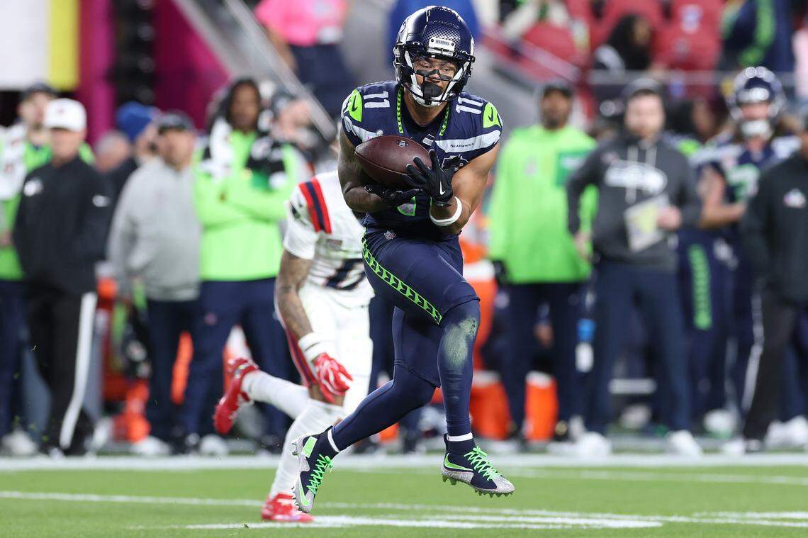 Jaxon Smith-Njigba (11) of the Seattle Seahawks catches a pass against the New England Patriots during the third quarter of Super Bowl LX at Levi's Stadium on Feb. 8, 2026 in Santa Clara, Calif.