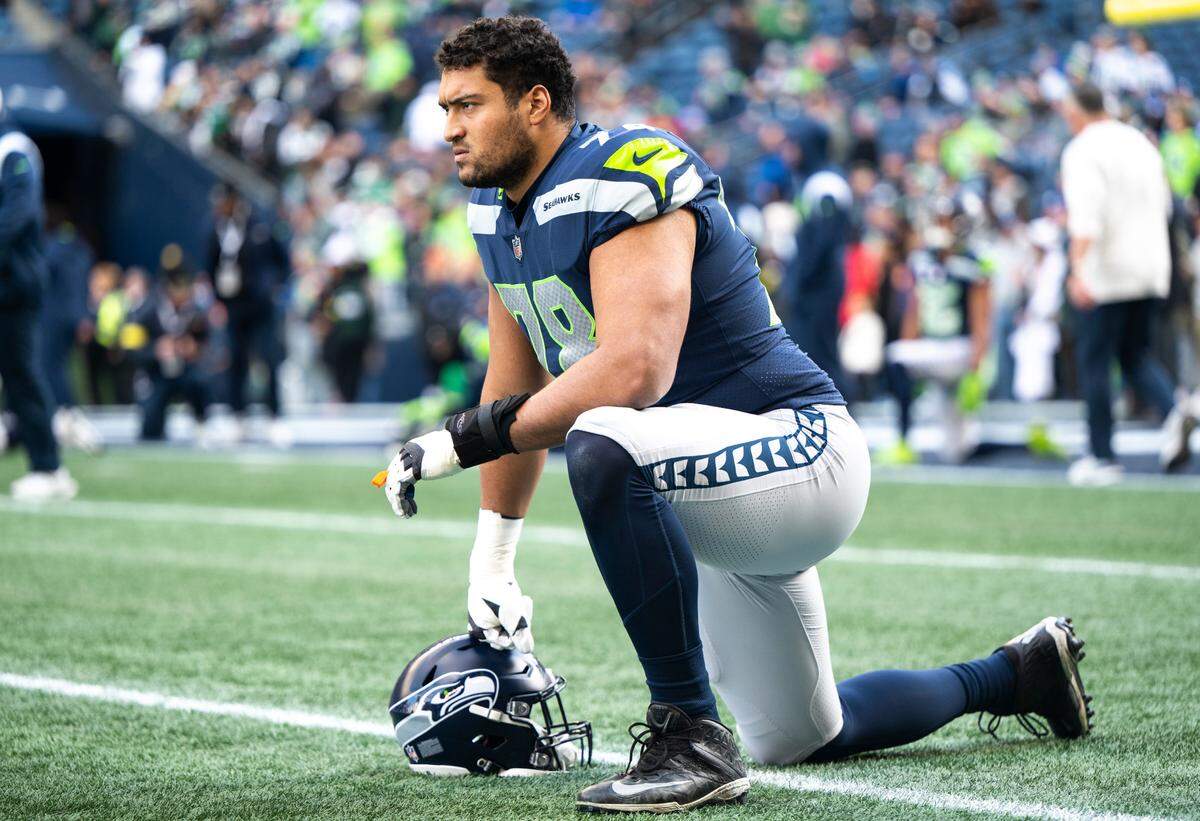 Seattle Seahawks offensive tackle Stone Forsythe (78) stretches before the start of an NFL game against the New York Jets at Lumen Field in Seattle, Wash. on Jan. 1, 2023.