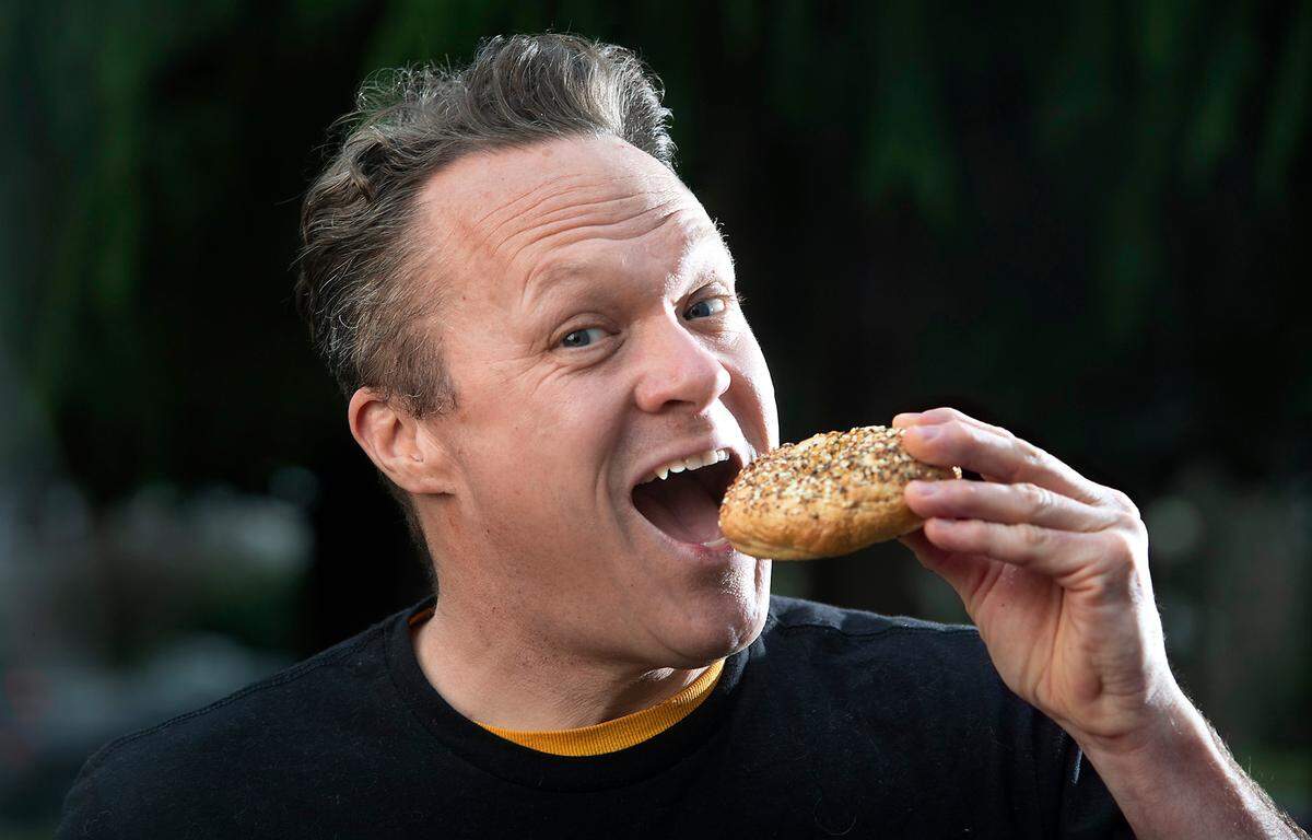 Adam’s Bagels owner Adam Dealan-de takes his tasty bagels on the road for “if you know, you know” delivery locations like Wright Park in Tacoma, Washington, shown on Wednesday, Jan. 5, 2022.