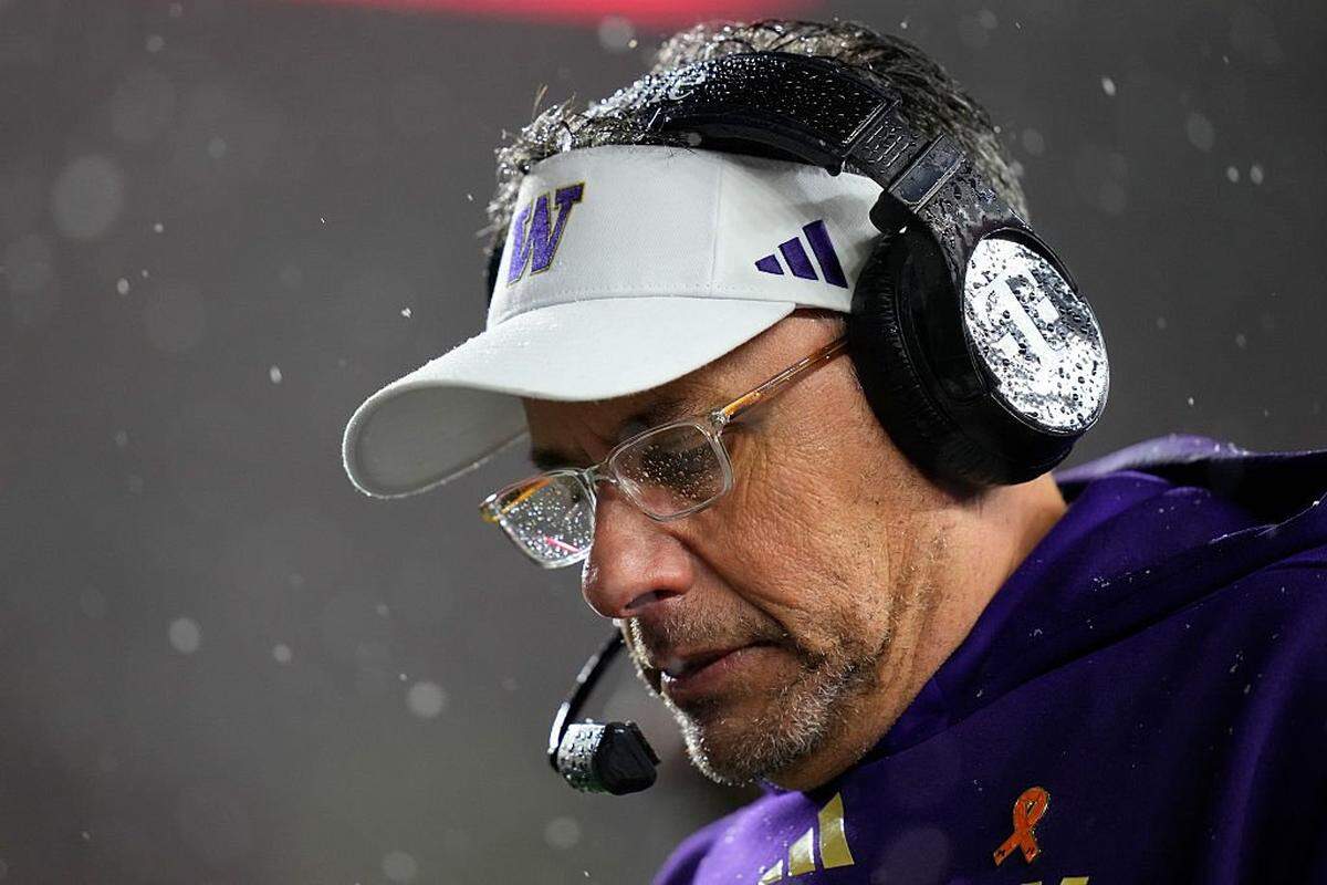 MADISON, WISCONSIN - NOVEMBER 08: Head coach Jedd Fisch of the Washington Huskies looks at a play sheet in the fourth quarter against the Wisconsin Badgers at Camp Randall Stadium on November 08, 2025 in Madison, Wisconsin. (Photo by John Fisher/Getty Images)