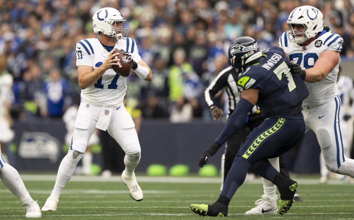 Indianapolis Colts quarterback Philip Rivers (17) looks to throw during the first quarter of the game against the Seattle Seahawks at Lumen Field, on Sunday, Dec. 14, 2025, in Seattle.