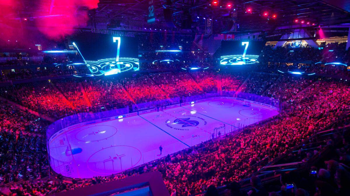 A packed house in Climate Pledge Arena cheers as the final seconds count down to the release of the starting Seattle Kraken players onto the ice for introductions Saturday, Oct. 23, 2021.