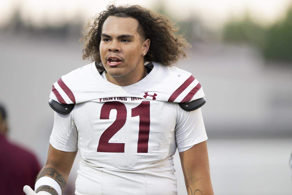 O'Dea Fighting Irish defensive end David Schwerzel (21) walks on the sidelines during the first half of the game against the Graham-Kapowsin Eagles at Art Crate Field, on Friday, Sept. 5, 2025, in Spanaway, Wash.