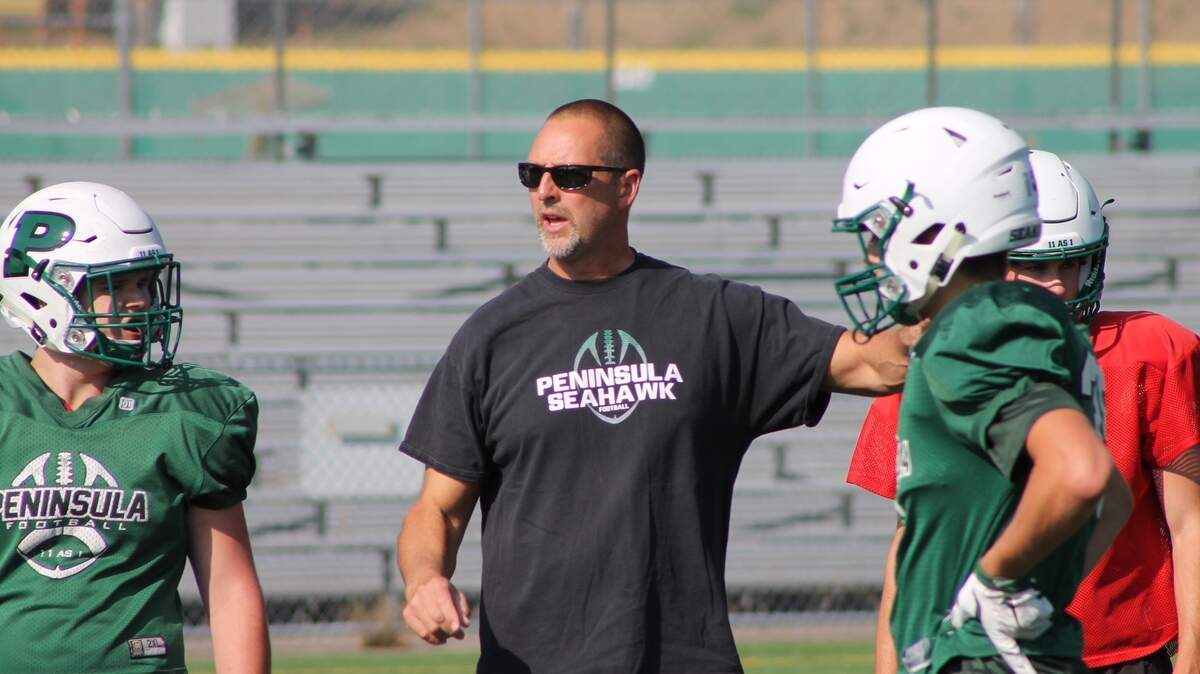 Peninsula coach Ross Filkins at practice on Thursday afternoon at Roy Anderson Field.
