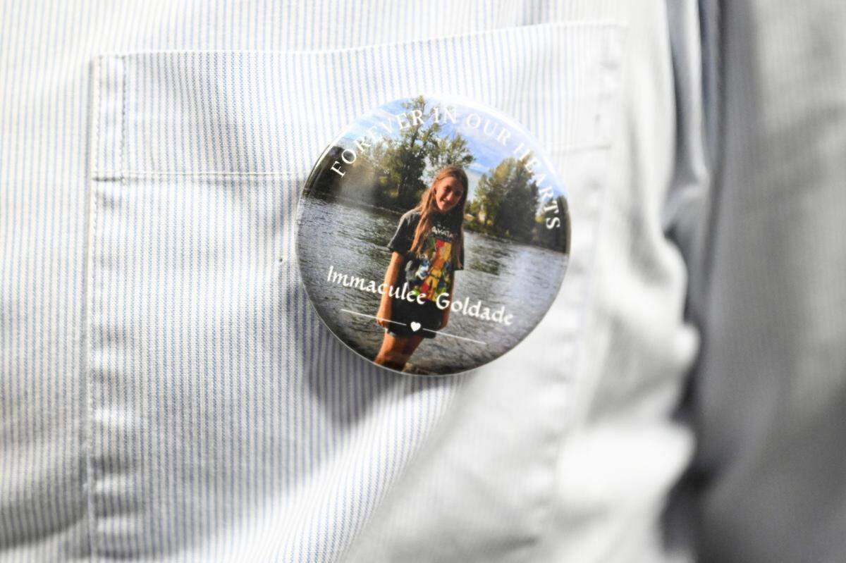 Friends and family of Immaculee Goldade wear pins with her likeness at Terry Kohl’s sentencing for vehicular homicide and vehicular assault for driving a stolen truck and striking and killing 12-year-old Immaculee and injuring her friend Kathleen Olson, at Pierce County Superior Court, Friday, Aug. 11, 2023, in Tacoma. Kohl was convicted of hitting Goldade and Olson on Jan. 15, 2022.