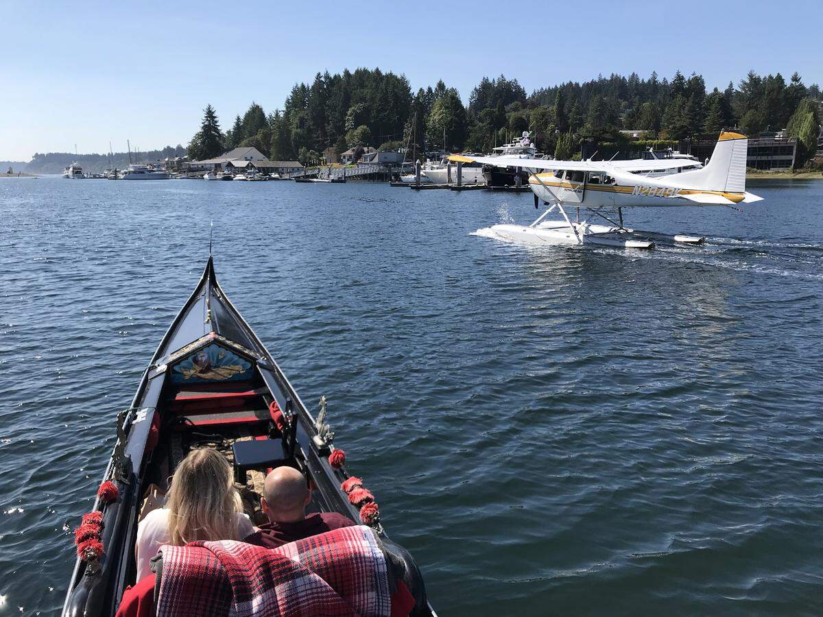 Synco, owner of Gig Harbor Gondola, picked up passengers from a Kenmore Air seaplane for a gondola ride in 2018, in Gig Harbor, Wash.