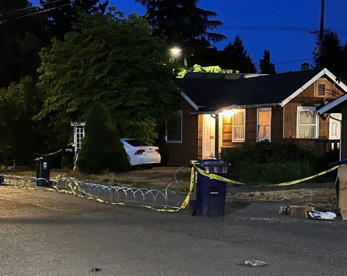 On Tuesday morning, neighbor Michelle Haynes took this photograph of the home of a man shot to death by Tacoma police later that afternoon. Neighbors told The News Tribune he had been acting erratically in the days before the shooting.