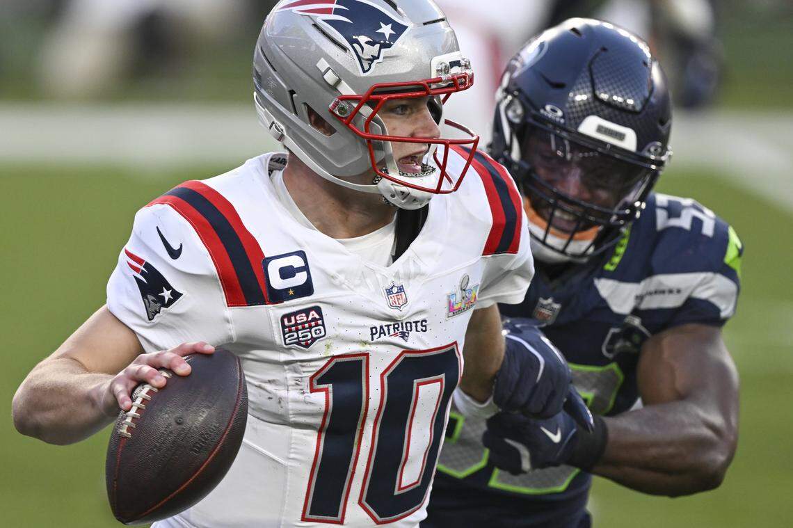 New England Patriots quarterback Drake Maye (10) is tackled by Seattle Seahawks Boye Mafe (53) during Super Bowl LX at Levi’s Stadium in Santa Clara on Sunday, Feb. 8, 2026.