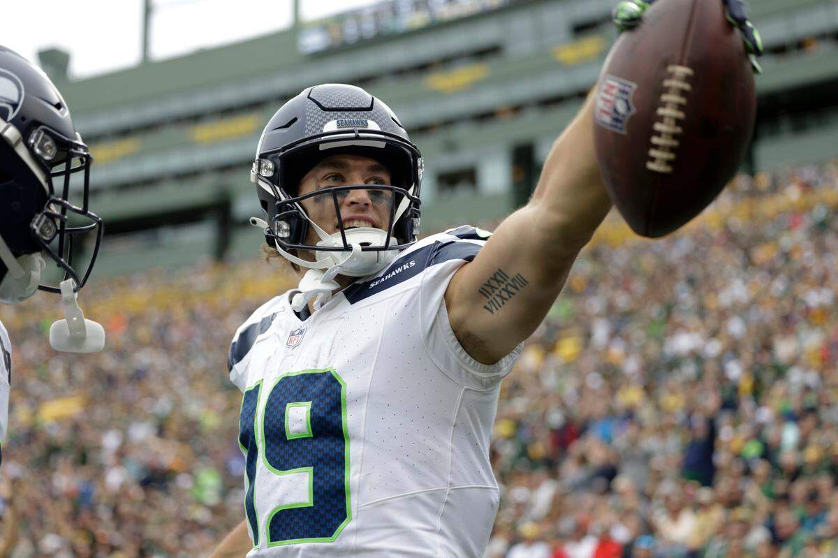 Seattle Seahawks wide receiver Jake Bobo celebrates after catching an 18-yard touchdown pass in the first half of a preseason NFL football game against the Green Bay Packers, Saturday, Aug. 26, 2023, in Green Bay, Wis. (AP Photo/Matt Ludtke)