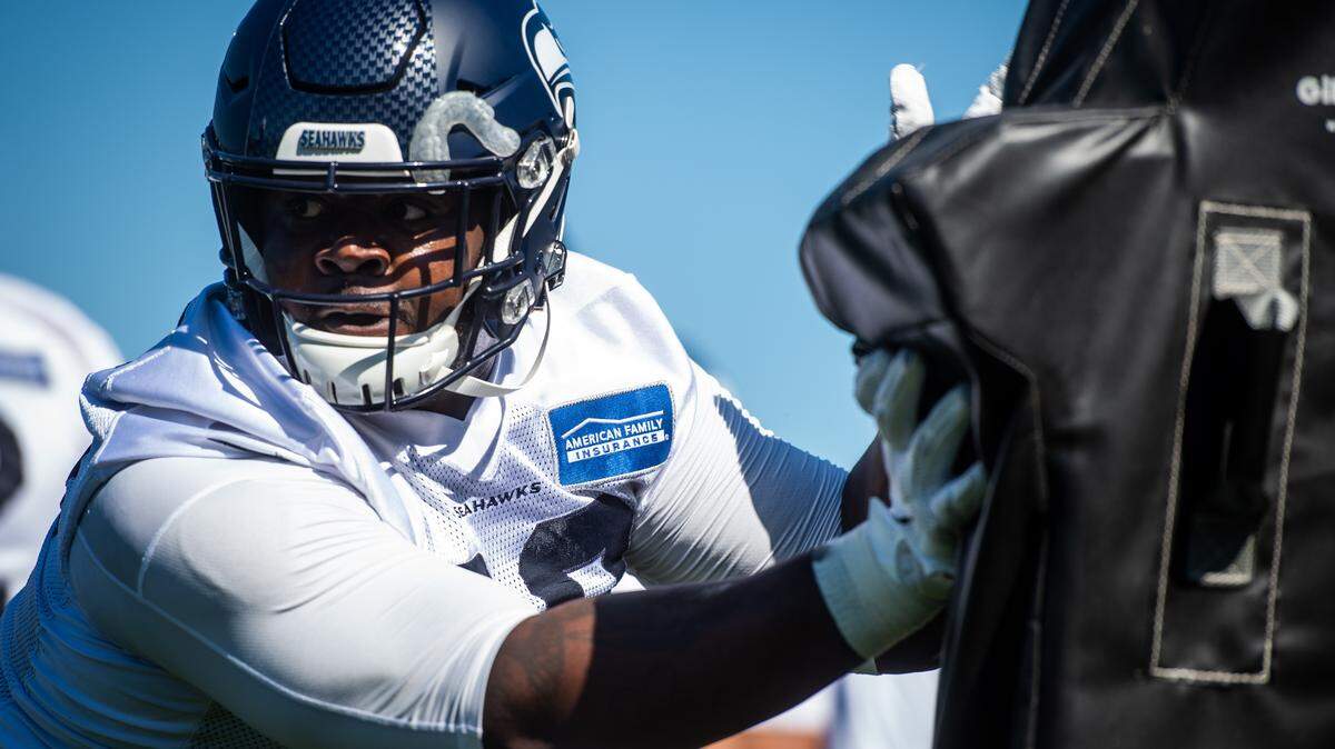 Jarran Reed participates in a drill at the Seattle Seahawks training camp at the Virginia Mason Athletic Center in Renton, Wash., on Thursday, July 25, 2019.