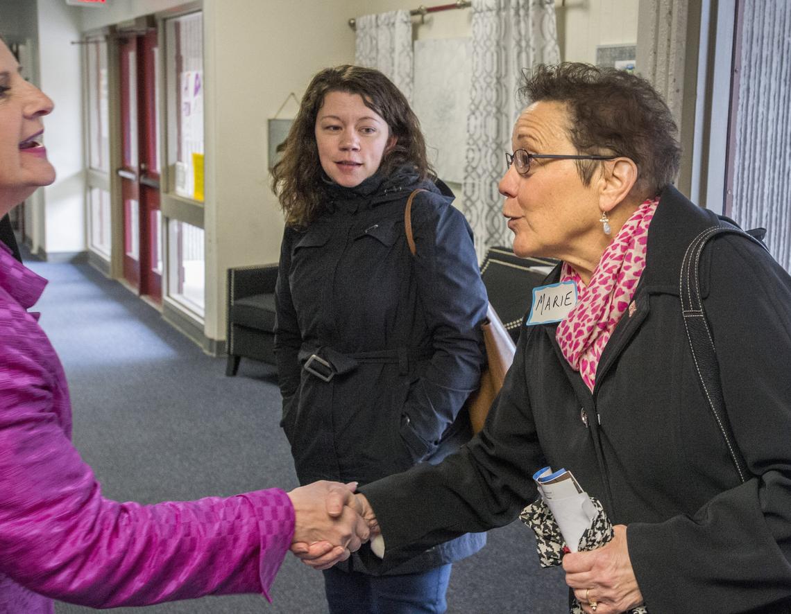 Marie Sipple (right) and Sarah Patinkin (center) meet principal Jeri Goebel while on a tour of Key Peninsula Middle School April 12.