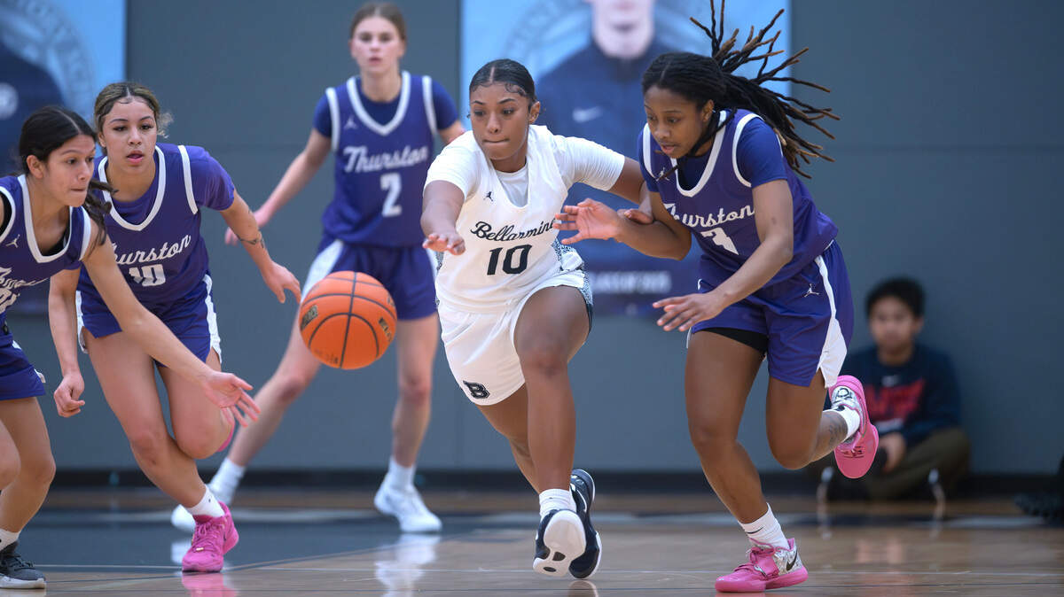 Bellarmine’ Kyla Frazier (10) races to a loose ball against North Thurston defenders (from left) Patricia Hope Egrubay, Sierra Cordis, Grace Lee and Soraya Ogaldez during Friday night’s girls basketball game at Bellarmine Preparatory School in Tacoma, Washington, on Jan. 17, 2025.