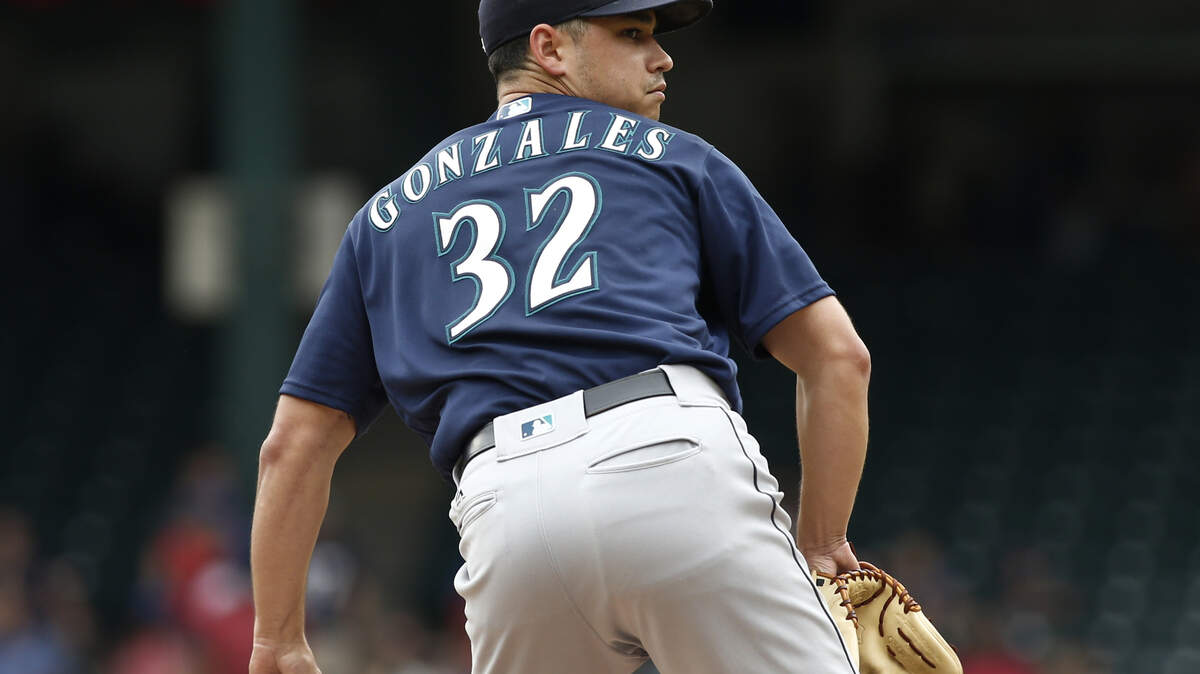 Seattle Mariners starting pitcher Marco Gonzales delivers against the Texas Rangers during the first inning of a baseball game Wednesday, Aug. 8, 2018, in Arlington, Texas. (AP Photo/Mike Stone)