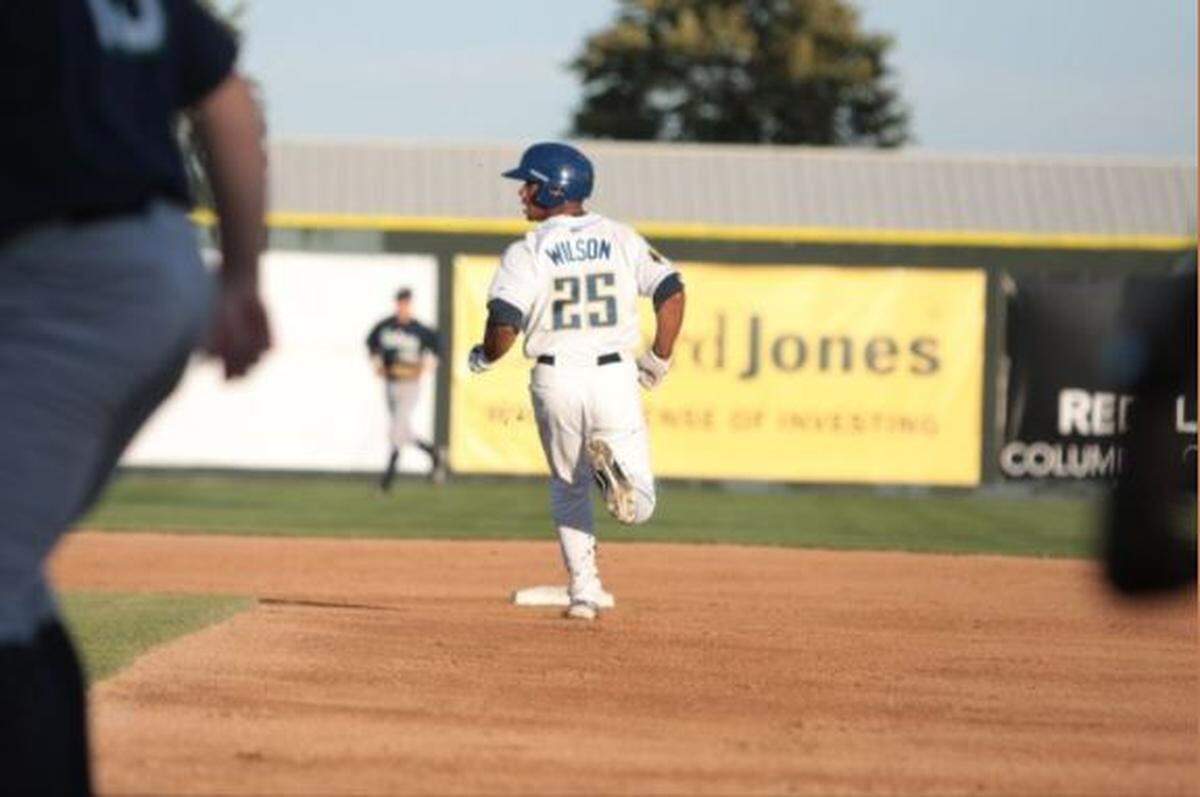 Russell Wilson running the bases as a second baseman for the Tri-City Dust Devils. The Seahawks quarterback played for the Class-A Northwest League baseball team in 2010, just after the Colorado Rockies selected him in the fourth round of the Major League Baseball draft.
