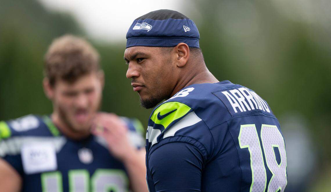 Seattle Seahawks tight end Elijah Arroyo (18) warms up during training camp at Virginia Mason Athletic Center on Friday, July 25, 2025, in Renton, Wash.