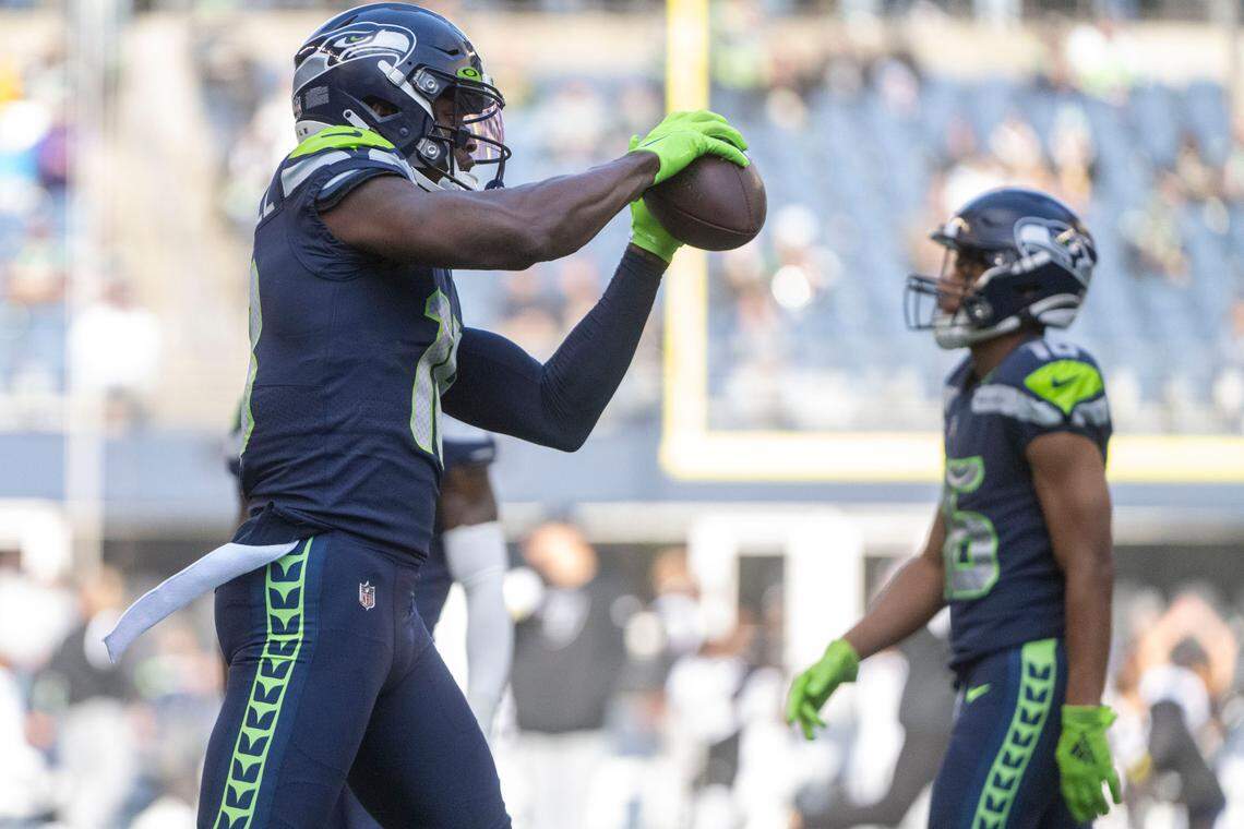 Seattle Seahawks wide receiver Laquon Treadwell (18) catches a pass during warms up prior to the start of an NFL game against against the Las Vegas Raiders on Sunday, Nov. 27, 2022, at Lumen Field in Seattle.