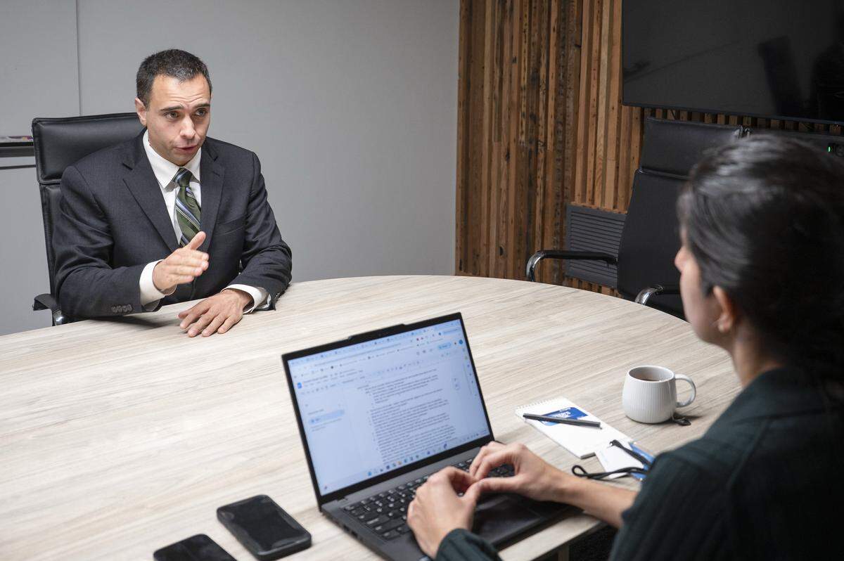 Tacoma Mayor-elect Anders Ibsen, left, speaks with The News Tribune on Friday, Dec. 5, 2025, in Tacoma, Wash.