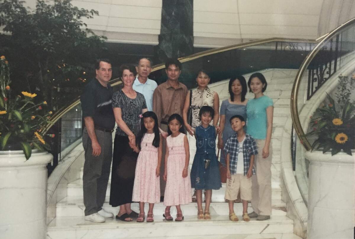 A picture of the MacKinnons and the Huang family during their first meeting in Nanning, Guangxi, China, in 2003.