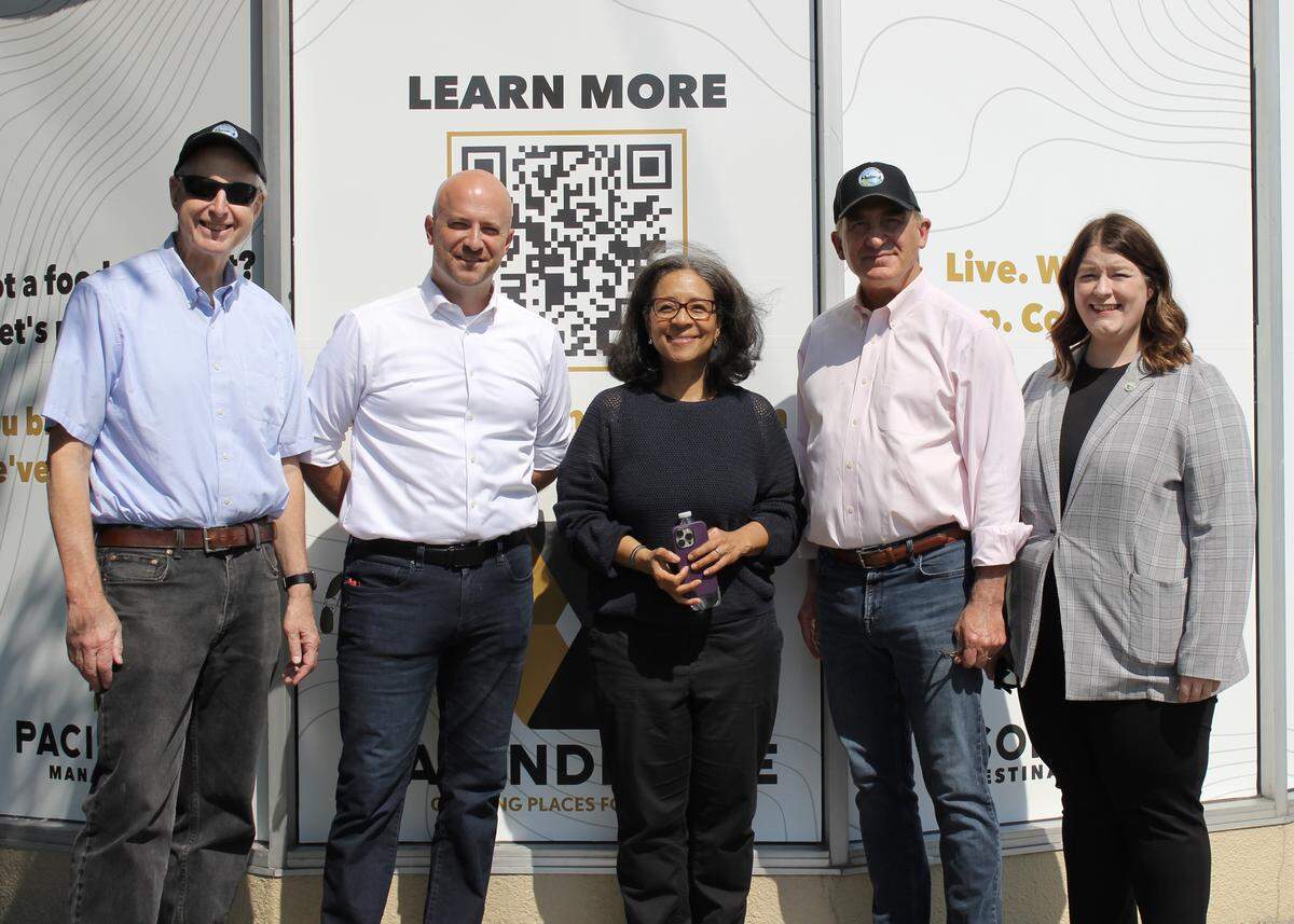 Puyallup’s representatives gather to celebrate a federal grant for the Meeker Festival Street Project. From left to right: Mayor Ned Witting, city council member Dennis King, congresswoman Marilyn Strickland and council members Jim Kastama and Lauren Adler.