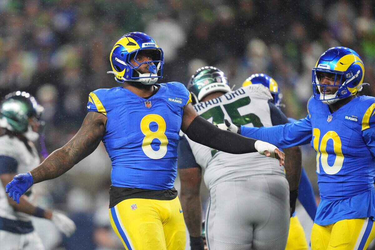 SEATTLE, WASHINGTON - DECEMBER 18: Jared Verse #8 of the Los Angeles Rams celebrates a tackle during the first quarter against the Seattle Seahawks at Lumen Field on December 18, 2025 in Seattle, Washington. (Photo by Soobum Im/Getty Images)