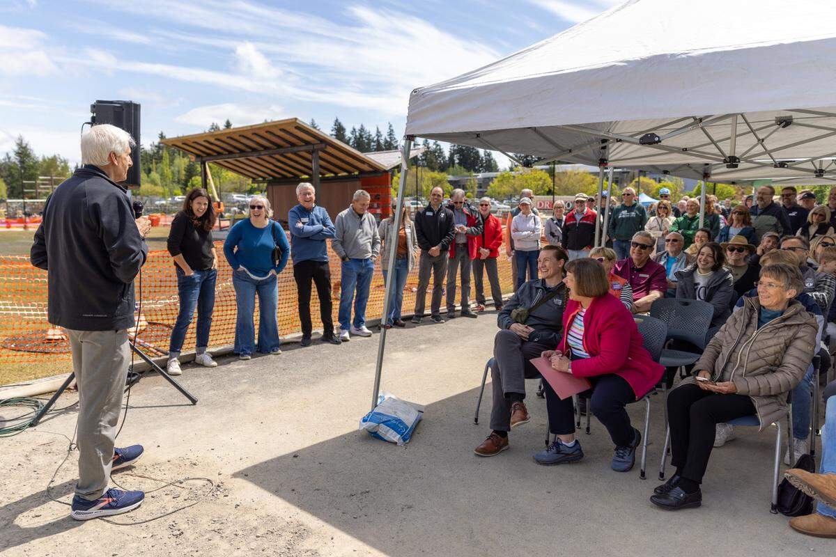 Charlie Davis, CEO and president of YMCA of Pierce and Kitsap Counties, addresses attendees of a groundbreaking event for Phase 1A of the Gig Harbor Sports Complex on Saturday, May 3, in Gig Harbor, Wash.