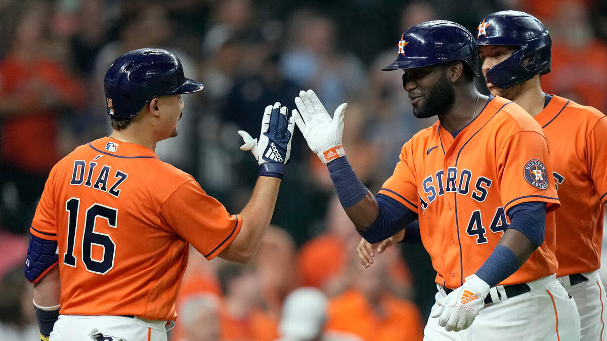 Houston Astros’ Yordan Alvarez (44) celebrates with Aledmys Diaz (16) after hitting a two-run home run against the Seattle Mariners during the third inning of a baseball game Friday, Aug. 20, 2021, in Houston. (AP Photo/David J. Phillip)