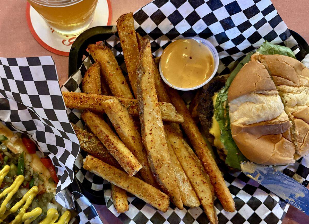 Lucky Silver Tavern on South Tacoma Way serves stiff drinks, cold beer and great food, especially the hand-cut fries dusted with Taekyung and furikake.