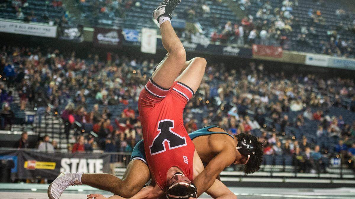 Spanaway Lakes’ Blade Gray wrestles Yelm’s Logan Platt in the 3A 195 pound championship during day two of Mat Classic XXXII at the Tacoma Dome in Tacoma, Wash., on Saturday, Feb. 22, 2020.