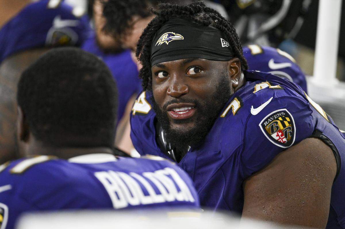 Aug 9, 2024; Baltimore, Maryland, USA; Baltimore Ravens offensive tackle Josh Jones (74) sits on the bench during the second half  of a preseason game against the Philadelphia Eagles  at M&T Bank Stadium. Mandatory Credit: Tommy Gilligan-USA TODAY Sports