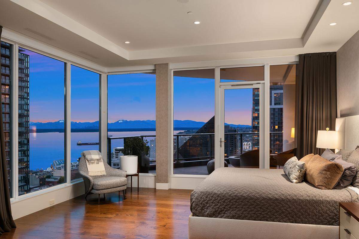 The primary suite is stunning with an Ipe-clad walk-in shower.