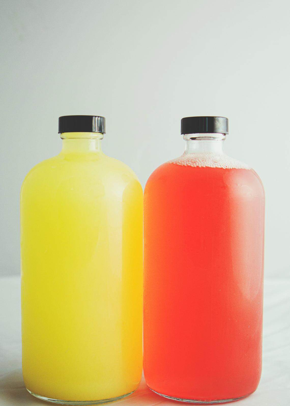 The Mule Tavern, a neighborhood cocktail bar in South Tacoma, sells its housemade ginger beer (left) and tonic (right) in growlers to enjoy at home.