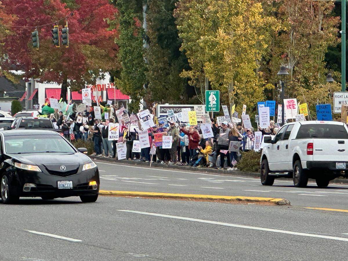 Crowds turned out Saturday for the No Kings protest at the intersection of Point Fosdick and Olympic Drive in Gig Harbor.