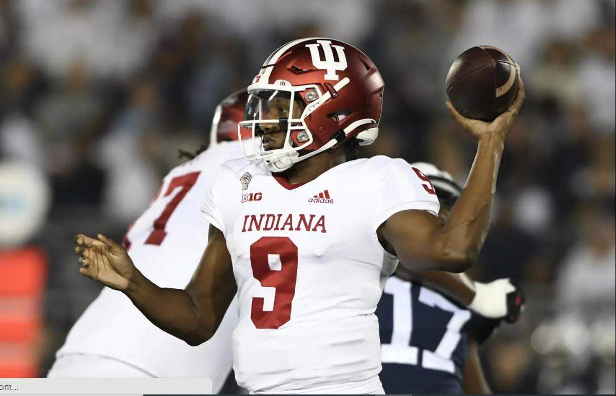 Then with Indiana, Michael Penix Jr. throws in the first quarter of a game at Penn State in State College, Pennsylvania, Oct. 2, 2021.