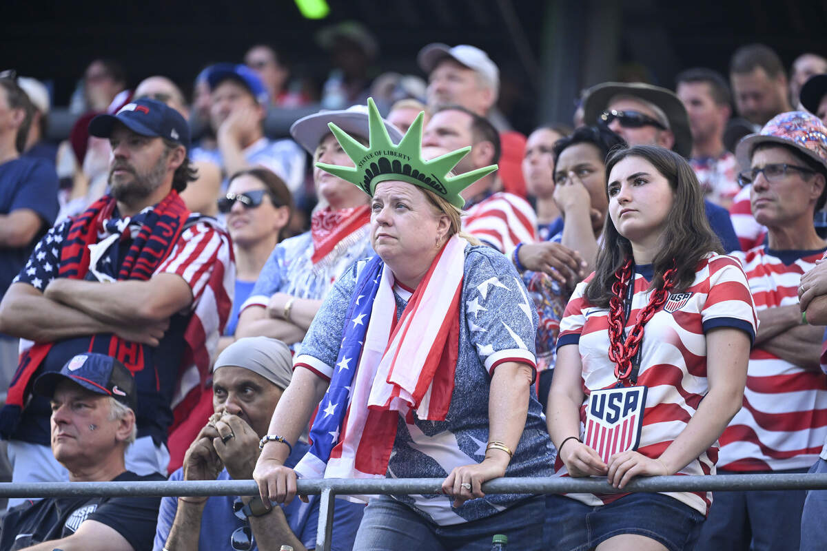 United States of America fans look solemn in the Lumen Field stands after a third Belgium goal during a round of sixteen FIFA World Cup match on Monday, July 6, 2026, in Seattle.