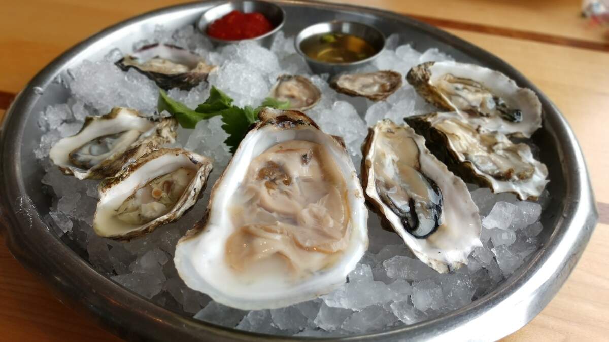 A plate of raw oysters on the half shell from Anthony’s Restaurants.