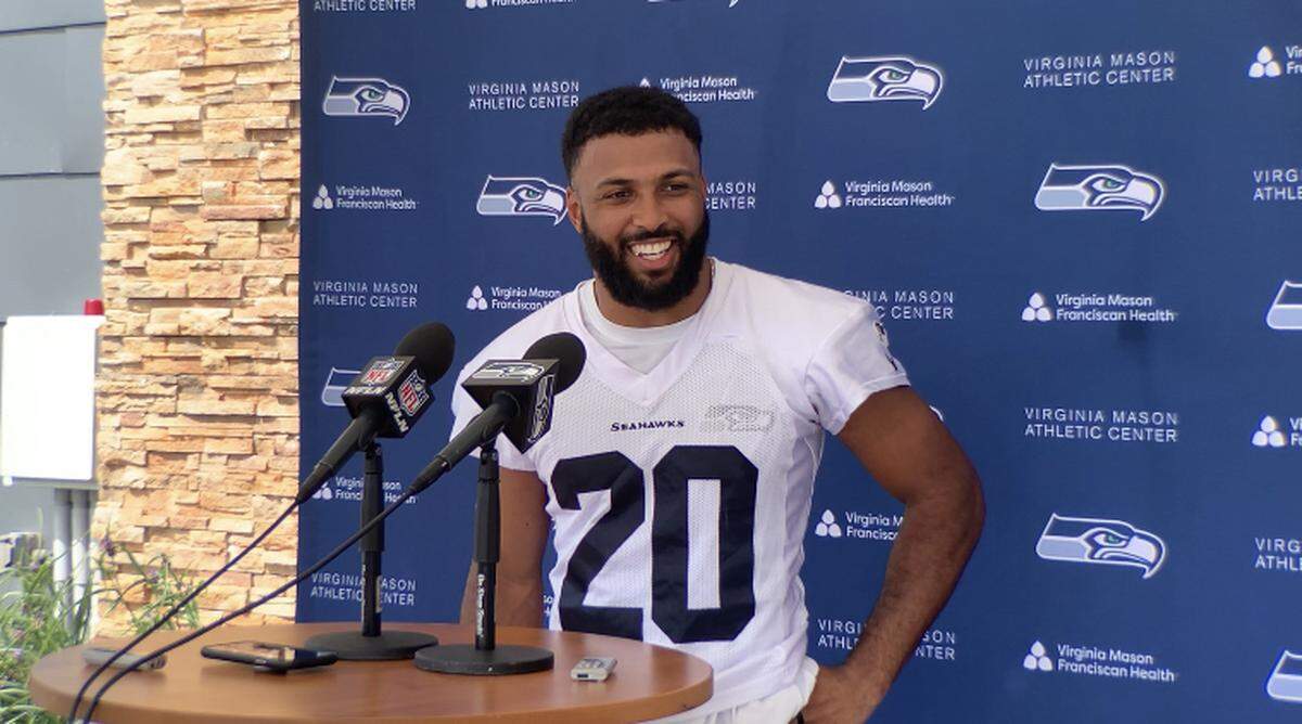 New safety Julian Love smiles following a practice during the Seahawks’ minicamp at their Virginia Mason Athletic Center in Renton on June 7, 2023.